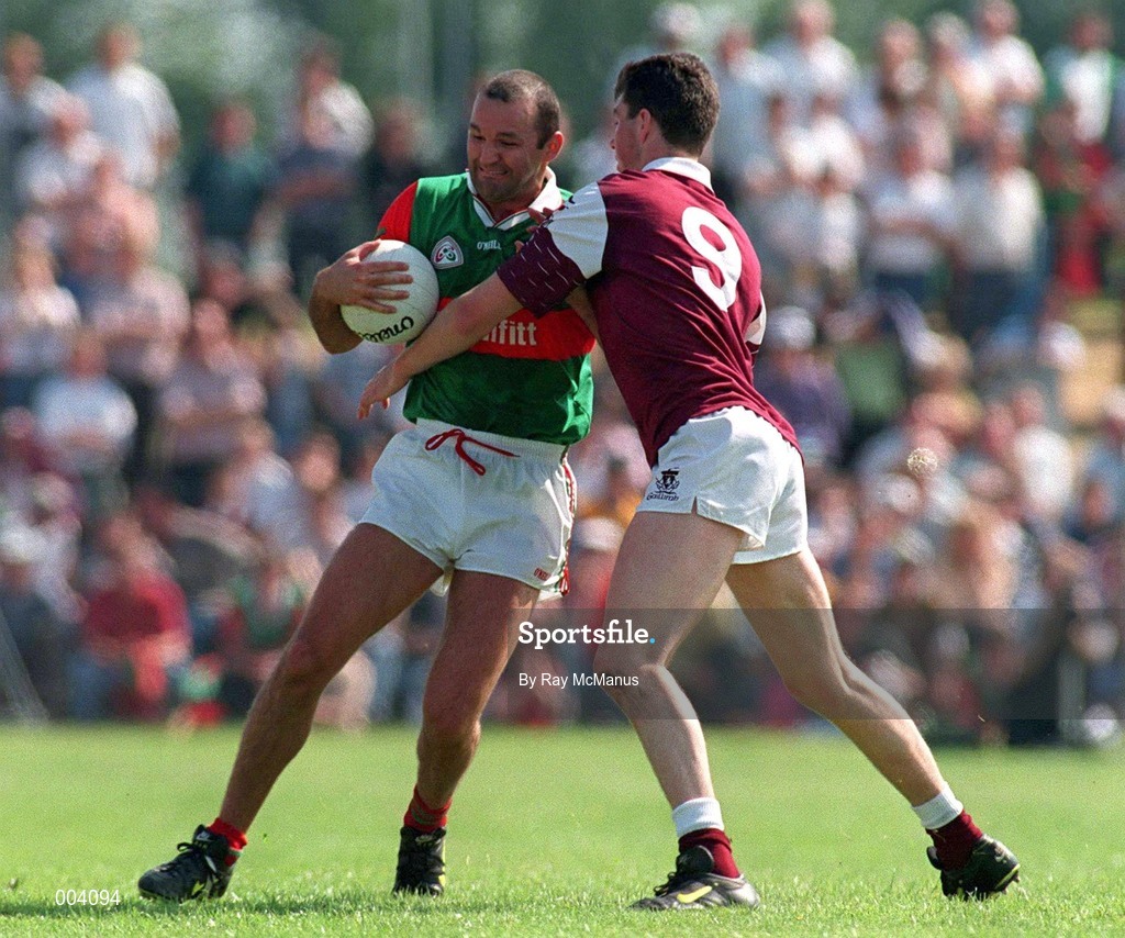 25 May 1997; Liam McHale of Mayo in action against Sean O'Domhnaill of Galway during the GAA Football Senior Championship Quarter-Final match between Galway and Mayo at Tuam Stadium in Tuam, Galway. Photo by Ray McManus/Sportsfile