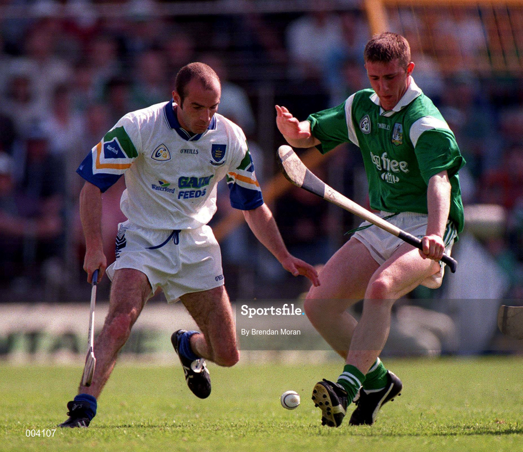 25 May 1997; James Moran of Limerick in action against Mark O'Sullivan of Waterford during the Munster Senior Hurling Championship Quarter-Final between Limerick and Waterford at Semple Stadium in Thurles, Tipperary. Photo by Brendan Moran/Sportsfile