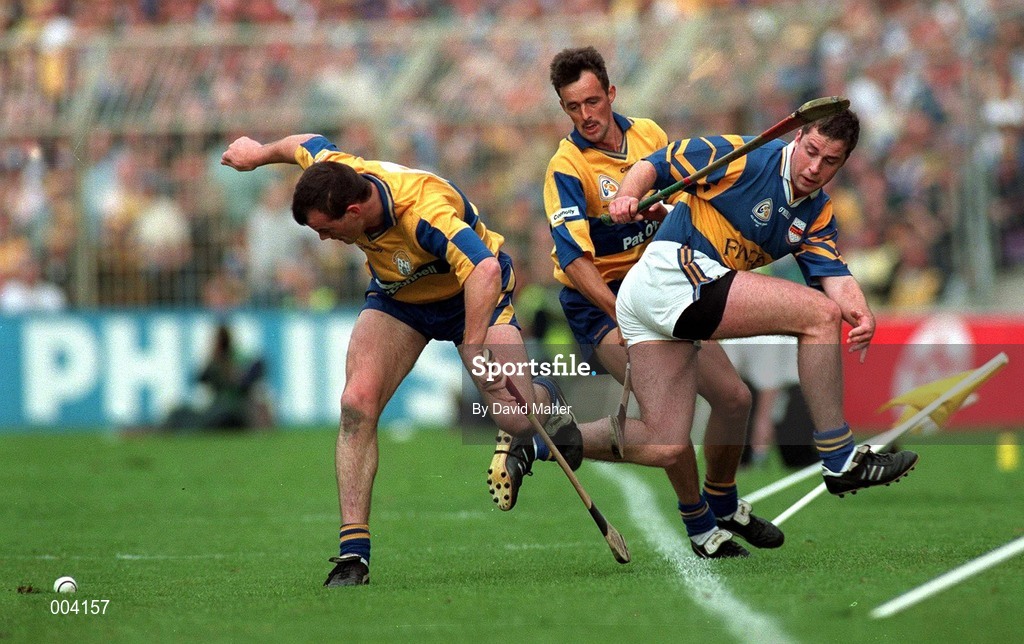 14 September 1997; Ollie Baker of Clare in action against Liam McGrath of Tipperary during the Guinness All Ireland Hurling Final match between Clare and Tipperary at Croke Park in Dublin. Photo by David Maher/Sportsfile