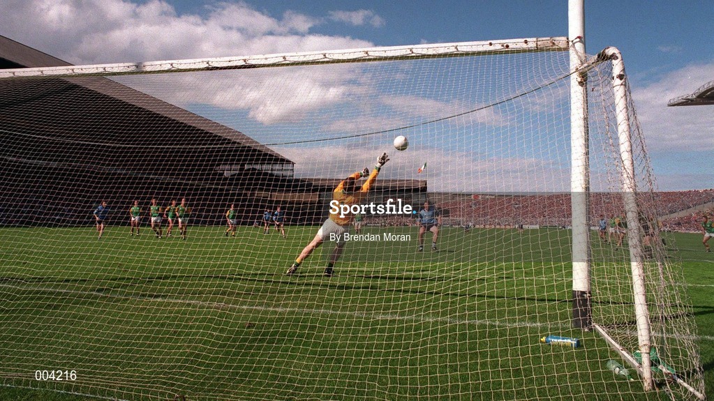 15 June 1997; Paul Bealin of Dublin blasts his penalty which was the last kick of the game, against the crossbar, as past Meath goalkeeper Conor Martin dives to save, during the GAA Senior Football Championship Quarter-Final match between Meath and Dublin at Croke Park in Dublin. Photo by Brendan Moran/Sportsfile