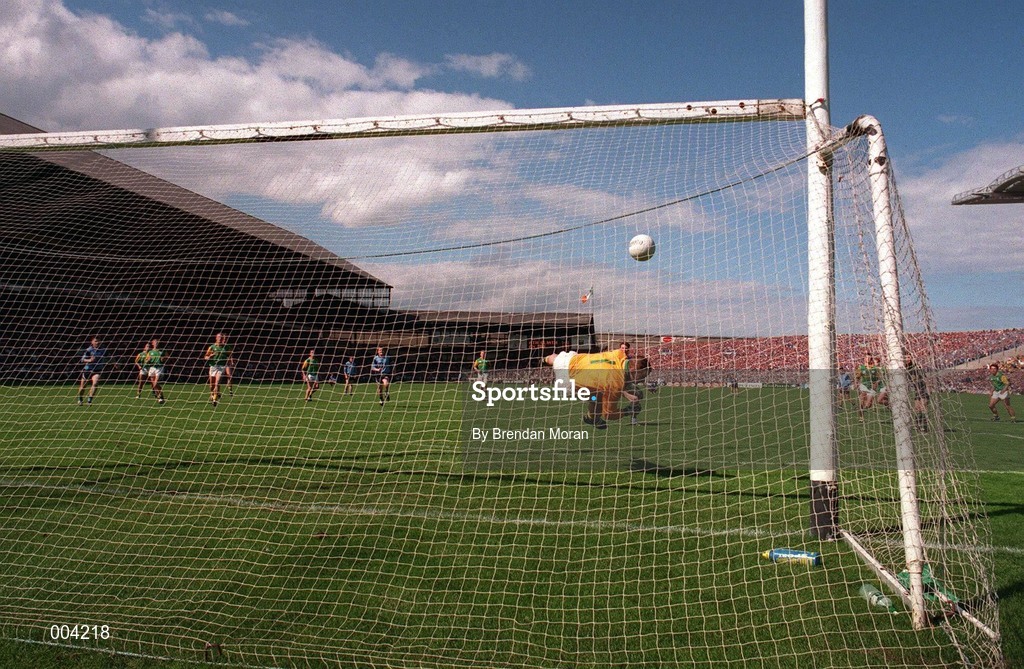 15 June 1997; Paul Bealin of Dublin blasts his penalty which was the last kick of the game, against the crossbar, as past Meath goalkeeper Conor Martin dives to save, during the GAA Senior Football Championship Quarter-Final match between Meath and Dublin at Croke Park in Dublin. Photo by Brendan Moran/Sportsfile