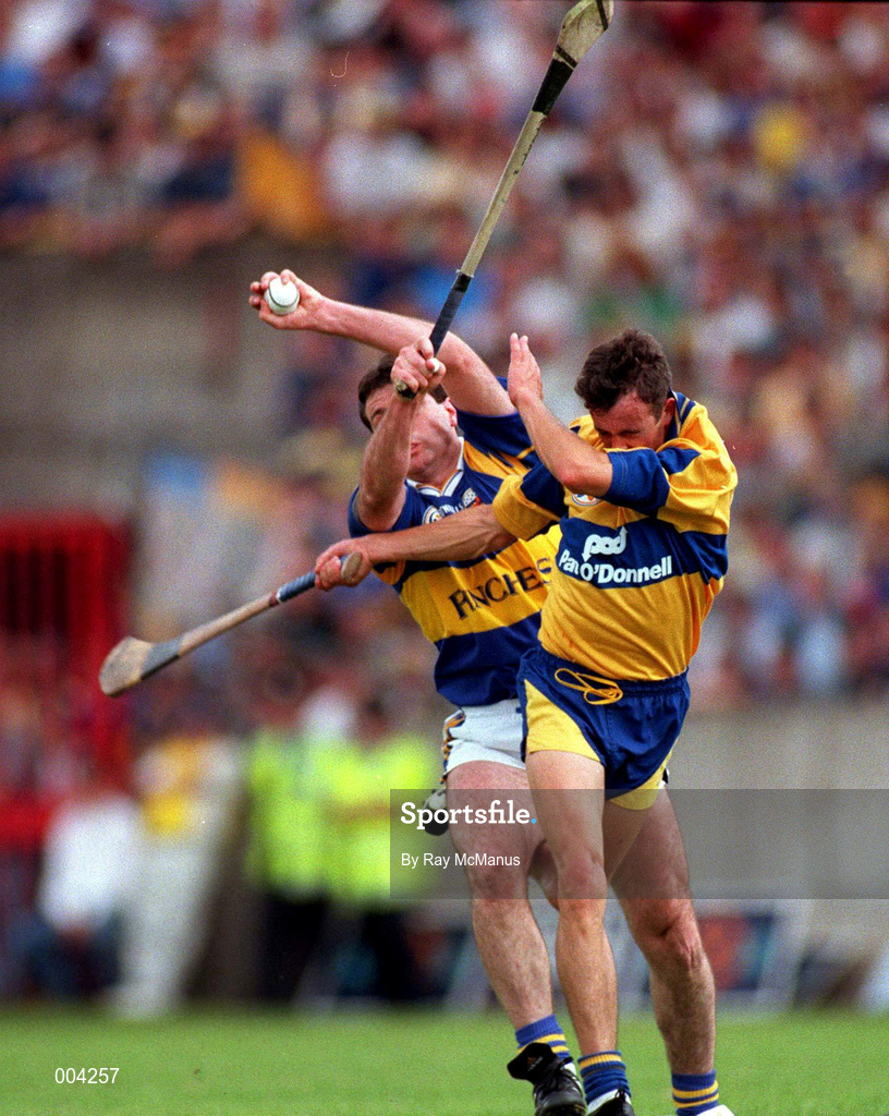 6 July 1997; Raymie Ryan of Tipperary in action against PJ O'Connell of Clare during the GAA Munster Senior Hurling Championship Final match between Clare and Tipperary at Páirc Uí Chaoimh in Cork. Photo by Ray McManus/Sportsfile
