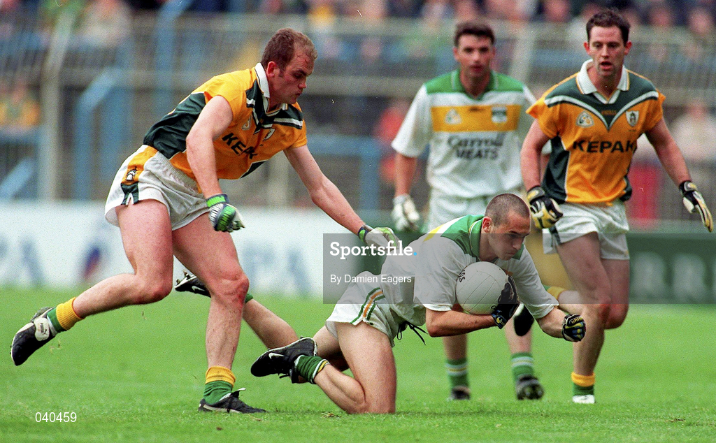 4 June 2000; Barry Malone of Offaly is tackled by John McDermott, left, and Ronan Fitzsimons of Meath during the Bank of Ireland Leinster Senior Football Championship Quarter-Final match between Offaly and Meath in Croke Park, Dublin. Photo by Damien Eagers/Sportsfile
