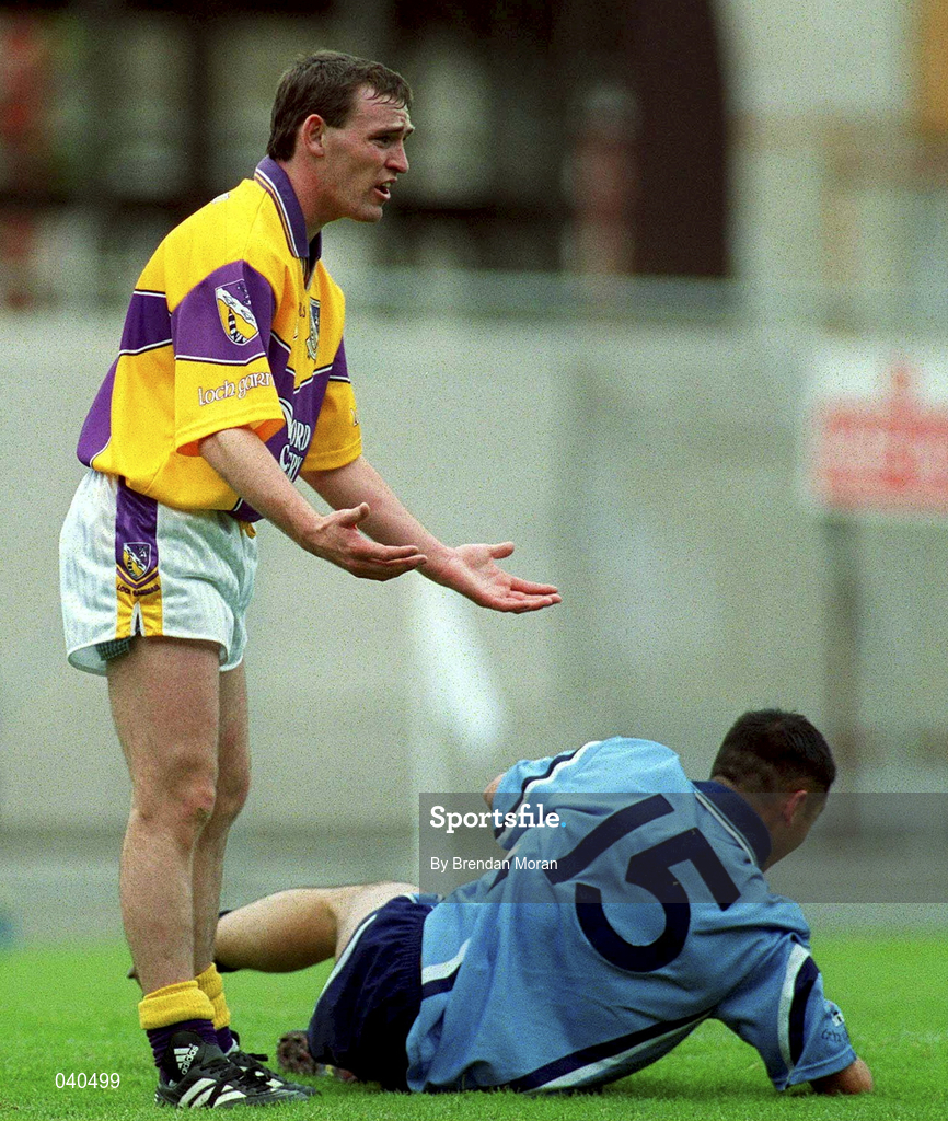 11 June 2000; Colm Morris of Wexford reacts to the referee after fouling Dublin's Jason Sherlock of Dublin during the Bank of Ireland Leinster Senior Football Championship Quarter-Final match between Dublin and Wexford at Croke Park in Dublin. Photo by Brendan Moran/Sportsfile