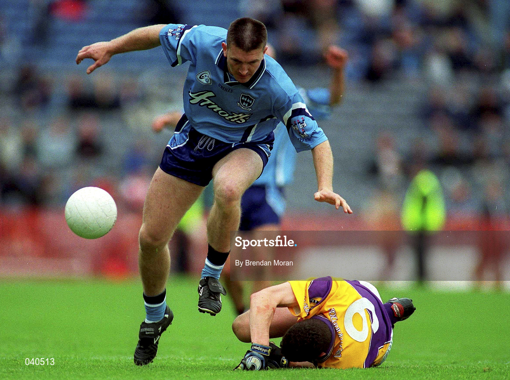 11 June 2000; Darren Homan of Dublin in action against Tom Howlin of Wexford during the Bank of Ireland Leinster Senior Football Championship Quarter-Final match between Dublin and Wexford at Croke Park in Dublin. Photo by Brendan Moran/Sportsfile