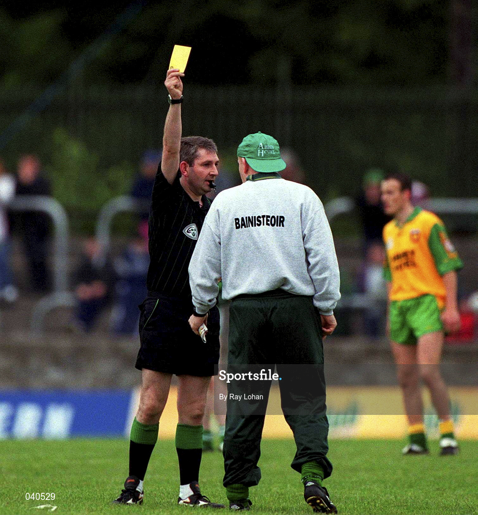 2 July 2000; Referee Des Joyce shows a yellow card to Donegal manager Declan Bonner during the Bank of Ireland Ulster Senior Football Championship Quarter-Final match between Donegal and Fermanagh at MacCumhaill Park in Ballybofey, Donegal. Photo by Ray Lohan/Sportsfile