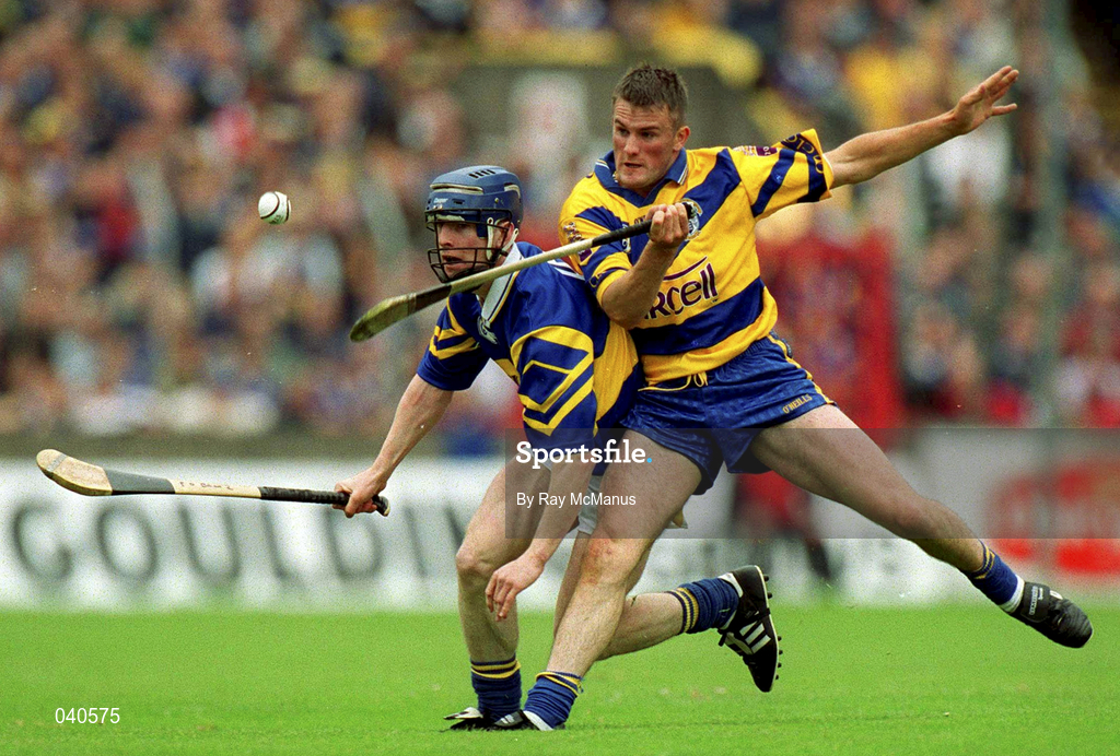 11 June 2000; Alan Markham of Clare in action against Paddy O'Brien of Tipperary during the Guinness Munster Senior Hurling Championship Semi-Final match between Tipperary and Clare at Páirc Ui Chaoimh in Cork. Photo by Ray McManus/Sportsfile