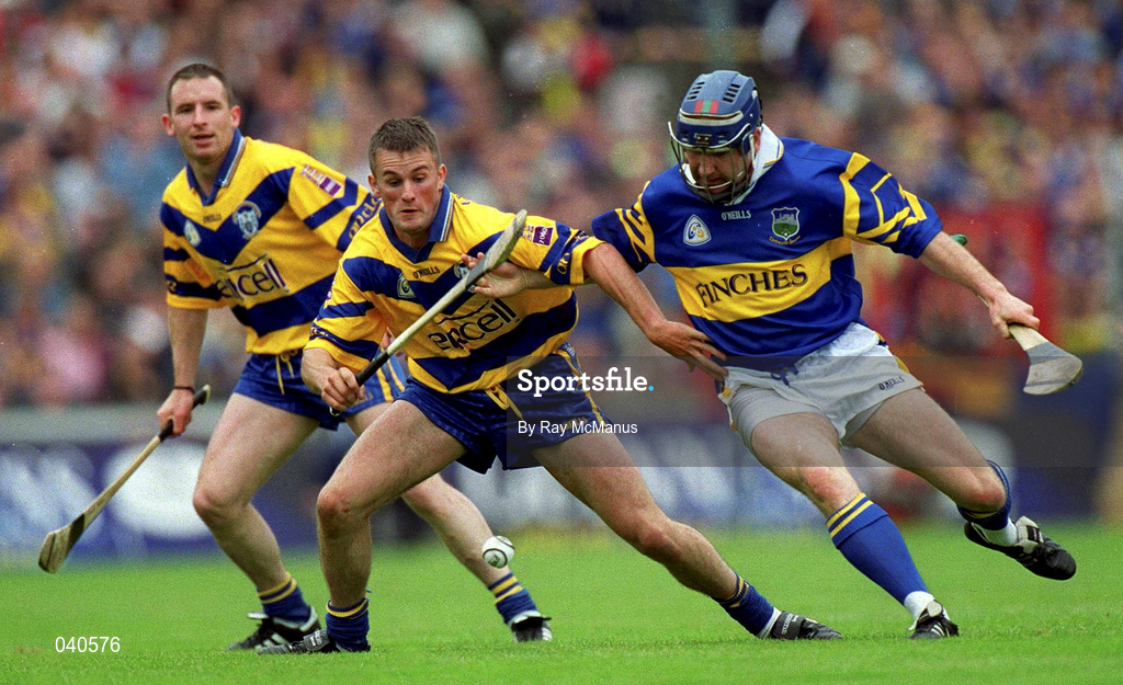 11 June 2000; Alan Markham of Clare in action against John Leahy of Tipperary during the Guinness Munster Senior Hurling Championship Semi-Final match between Tipperary and Clare at Páirc Ui Chaoimh in Cork. Photo by Ray McManus/Sportsfile