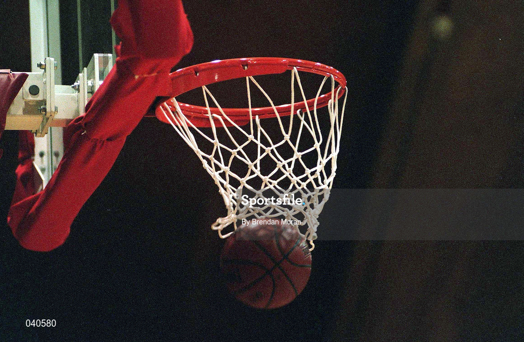 25 January 1998; A basketball goes through a basketball net during the Senior Men's Sprite National Cup Final between Denny Notre Dame and Neptune at the National Basketball Arena in Tallaght, Dublin. Photo By Brendan Moran/Sportsfile.