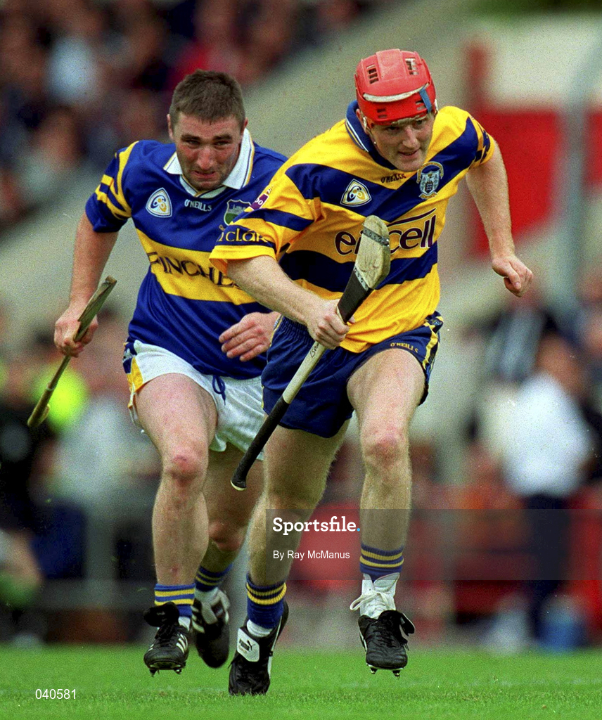 11 June 2000; Brian Logan of Clare in action against Paul Shelley of Tipperary during the Guinness Munster Senior Hurling Championship Semi-Final match between Tipperary and Clare at Páirc Ui Chaoimh in Cork. Photo by Ray McManus/Sportsfile