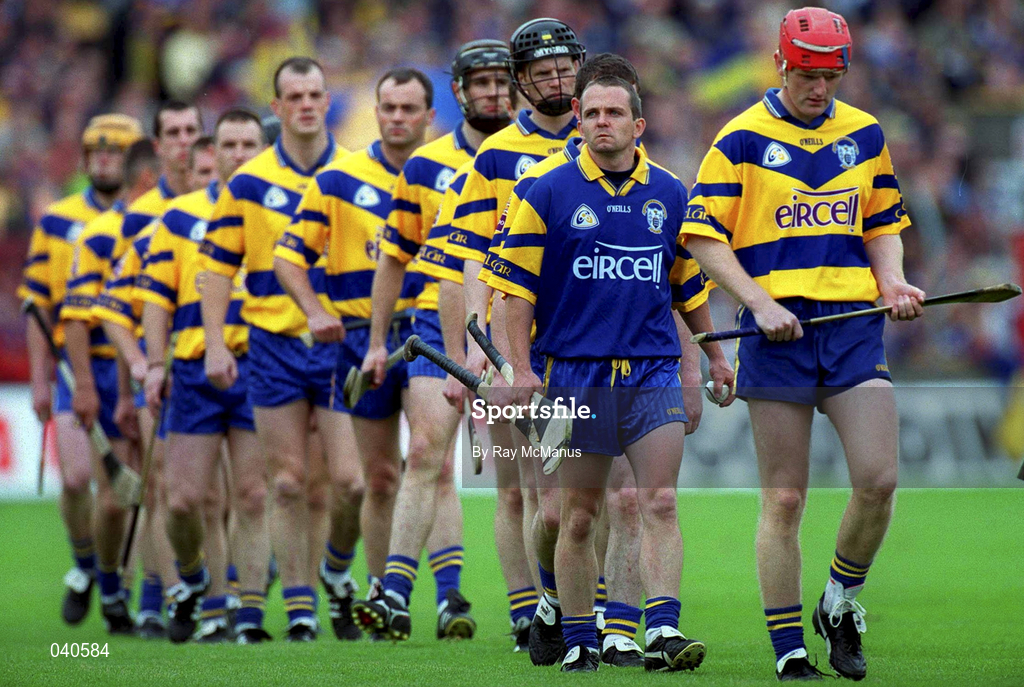 11 June 2000; Clare captain Brian Lohan and goalkeeper David Fitzgerald lead their side in pre-match parade prior to the Guinness Munster Senior Hurling Championship Semi-Final match between Tipperary and Clare at Páirc Ui Chaoimh in Cork. Photo by Ray McManus/Sportsfile