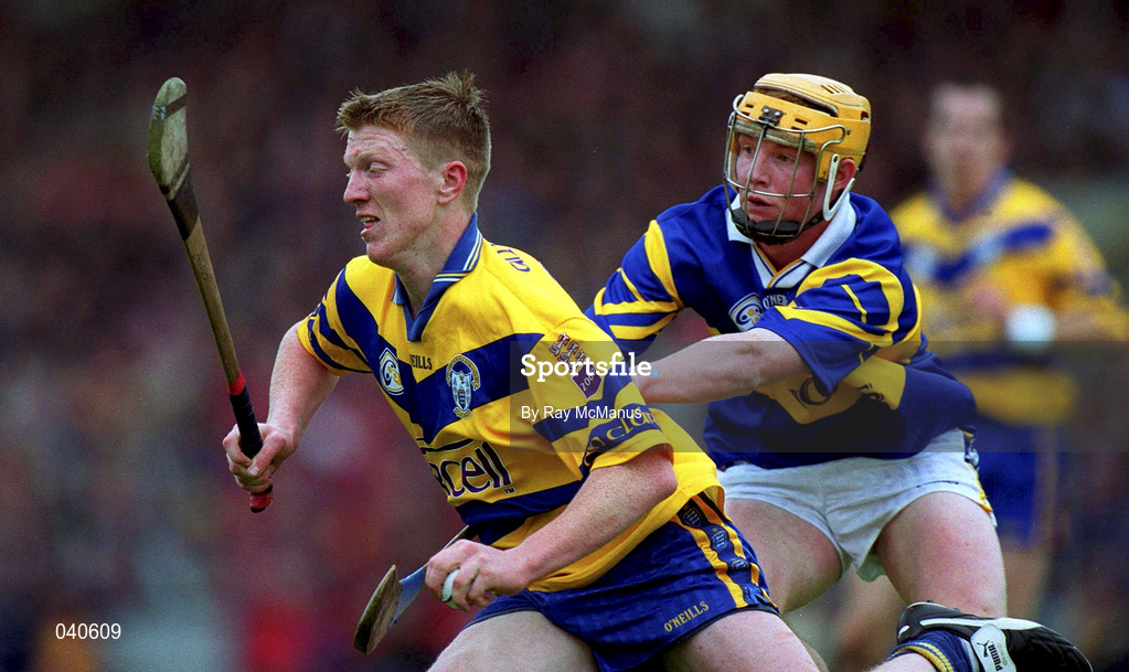 11 June 2000; Niall Gilligan of Clare in action against Michael Ryan of Tipperary during the Guinness Munster Senior Hurling Championship Semi-Final match between Tipperary and Clare at Páirc Ui Chaoimh in Cork. Photo by Ray McManus/Sportsfile
