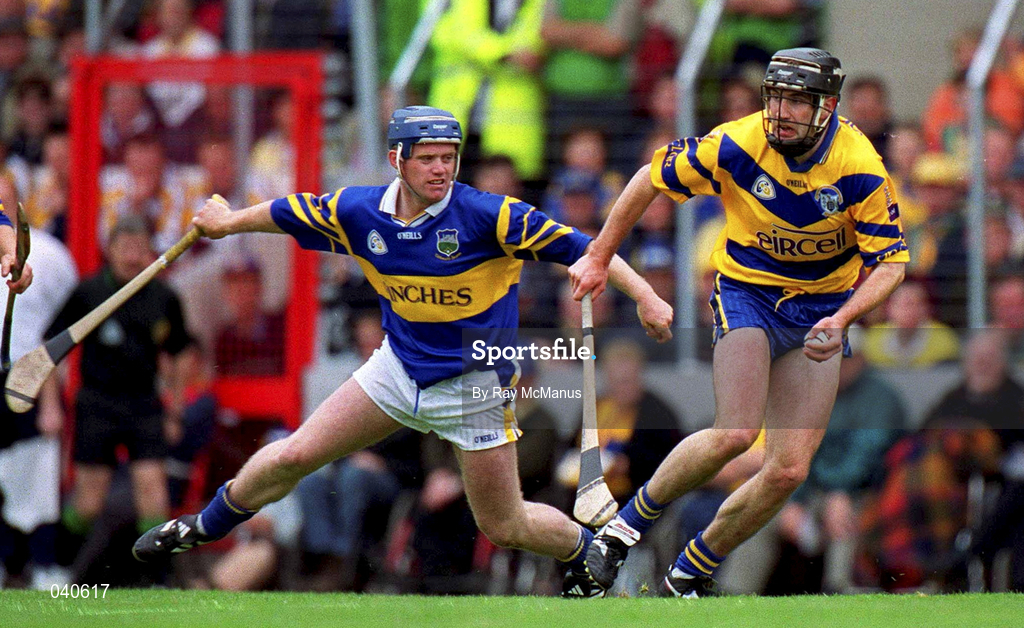 11 June 2000; Sean McMahon of Clare in action against Eugene O'Neill of Tipperary during the Guinness Munster Senior Hurling Championship Semi-Final match between Tipperary and Clare at Páirc Ui Chaoimh in Cork. Photo by Ray McManus/Sportsfile