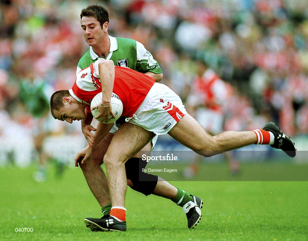 25 June 2000; Paddy McKeever of Armagh in action against Rory Gallagher of Fermanagh during the Bank of Ireland Ulster Senior Football Championship Semi-Final match between Armagh and Fermanagh at St Tiernach's Park in Clones, Monaghan. Photo by Damien Eagers/Sportsfile