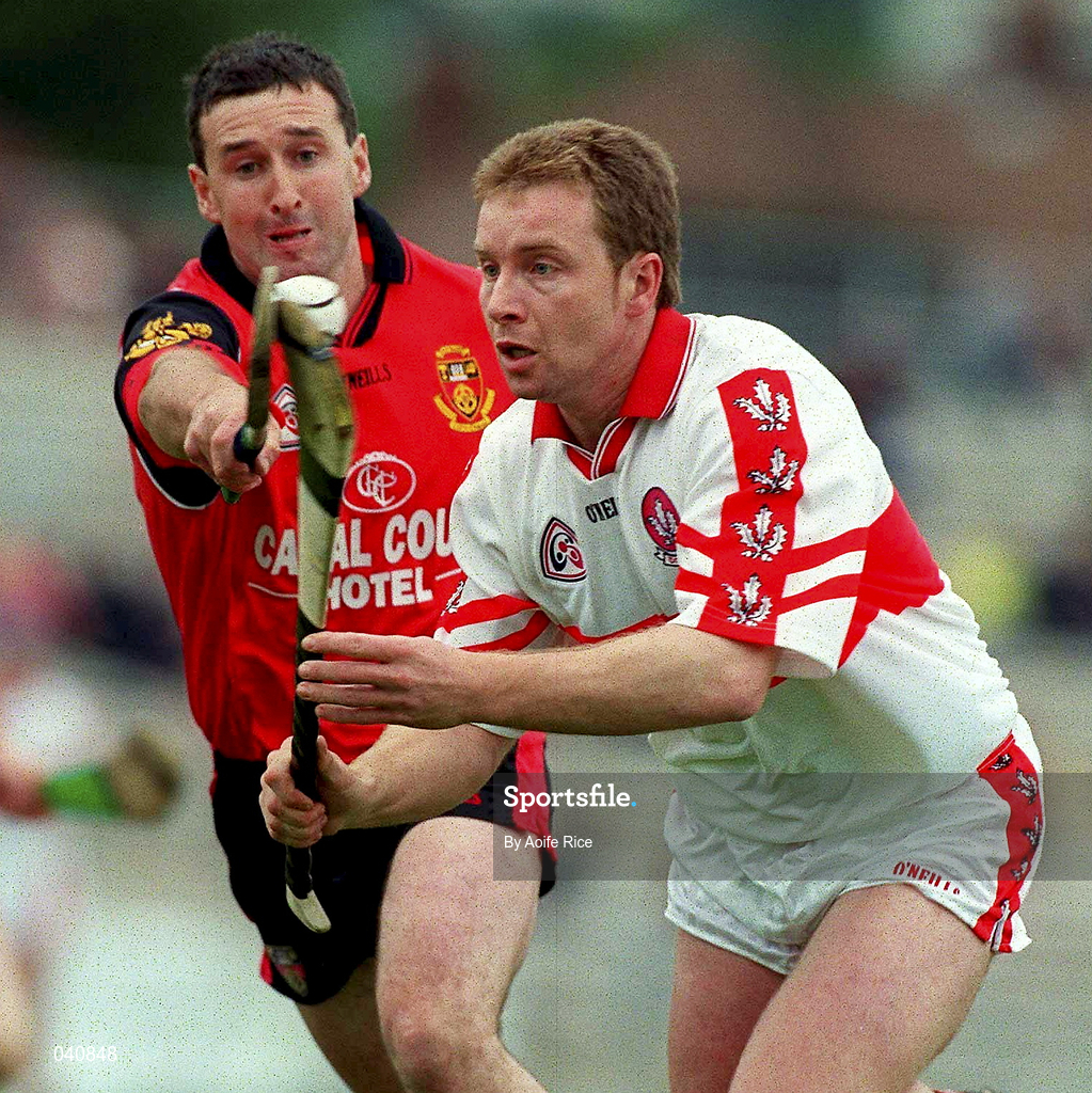 11 June 2000; Kieran McKeever of Derry in action against Donal Byers of Down during the Guinness Ulster Senior Hurling Championship Semi-Final between Derry and Down at Casement Park in Belfast, Antrim. Photo by Aoife Rice/Sportsfile