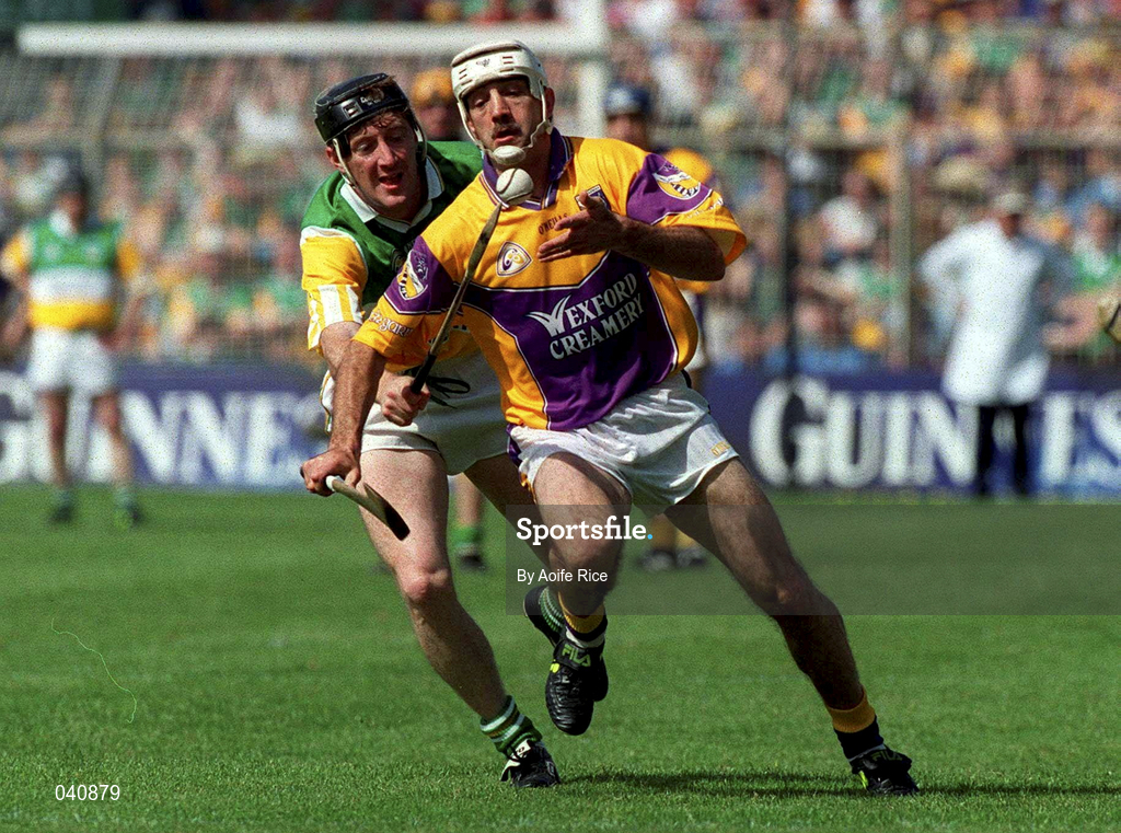 18 June 2000; Martin Storey of Wexford in action against Brian Whelahan of Offaly during the Guinness Leinster Senior Hurling Championship Semi-Final match between Offaly and Wexford at Croke Park in Dublin. Photo by Aoife Rice/Sportsfile