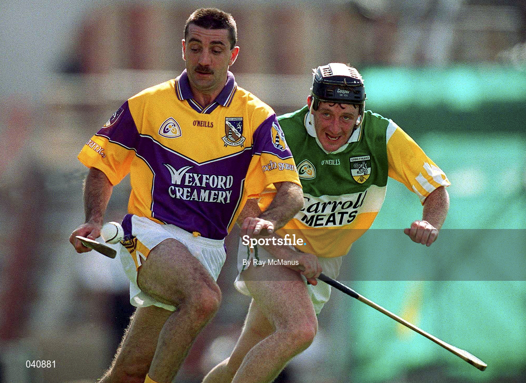 18 June 2000; Martin Storey of Wexford in action against Brian Whelahan of Offaly during the Guinness Leinster Senior Hurling Championship Semi-Final match between Offaly and Wexford at Croke Park in Dublin. Photo by Ray McManus/Sportsfile