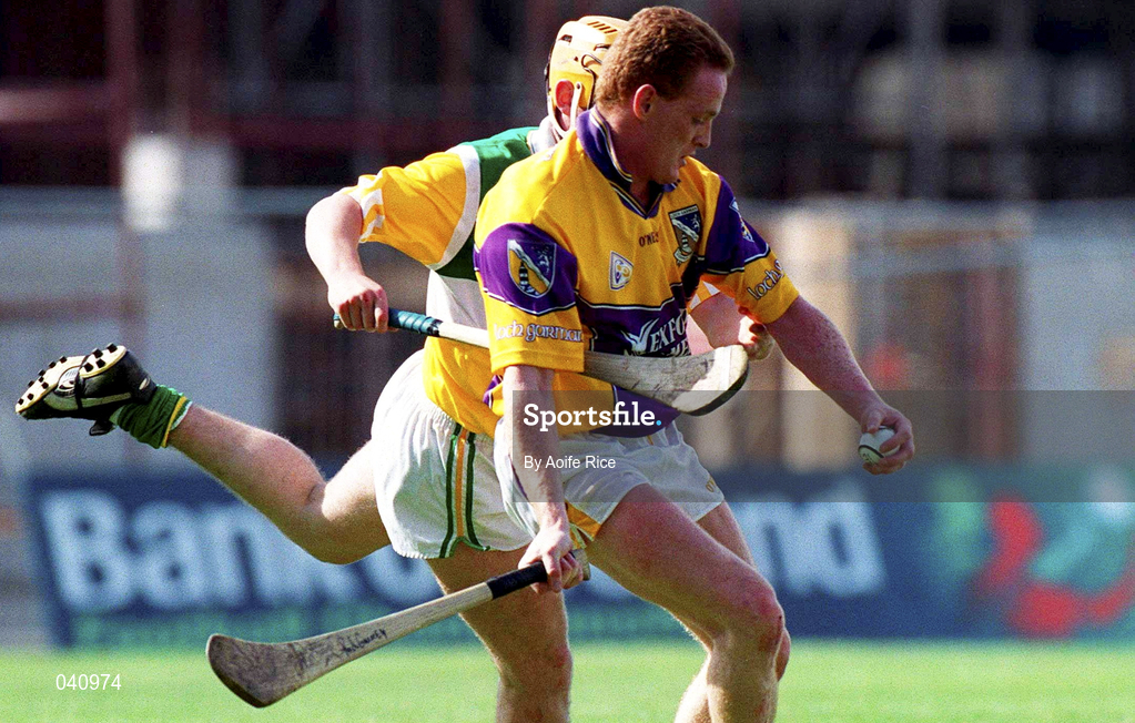 18 June 2000; Rod Guiney of Wexford in action against Paudie Mulhare of Offaly during the Guinness Leinster Senior Hurling Championship Semi-Final match between Offaly and Wexford at Croke Park in Dublin. Photo by Aoife Rice/Sportsfile