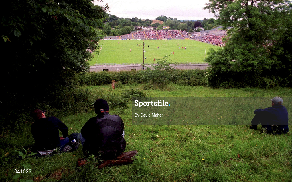 25 June 2000; Supporters look on from outside the stadium during the Bank of Ireland Ulster Senior Football Championship Semi-Final match between Armagh and Fermanagh at St Tiernach's Park in Clones, Monaghan. Photo by David Maher/Sportsfile