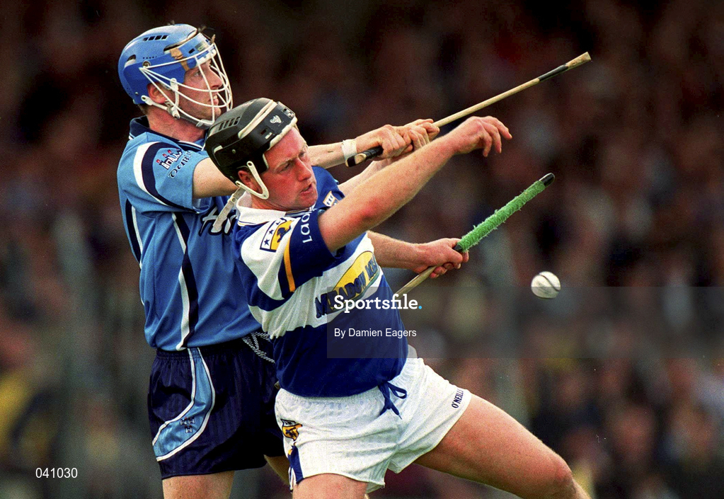 5 June 2000; David Cuddy of Laois in action against Stephen Perkins of Dublin during the Guinness Leinster Senior Hurling Championship Play-Off replay match between Dublin and Laois at O'Connor Park in Tullamore, Offaly. Photo by Damien Eagers/Sportsfile