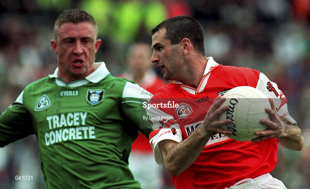 25 June 2000; Steven McDonnell of Armagh in action against Sean Burns of Fermanagh during the Bank of Ireland Ulster Senior Football Championship Semi-Final match between Armagh and Fermanagh at St Tiernach's Park in Clones, Monaghan. Photo by David Maher/Sportsfile