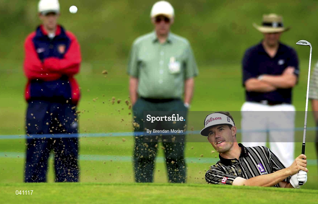 30 June 2000; Padraig Harrington of Ireland chips out of a bunker at the 16th green during the second day of the Murphy's Irish Open Golf Championship at Ballybunion Golf Club in Kerry. Photo by Brendan Moran/Sportsfile
