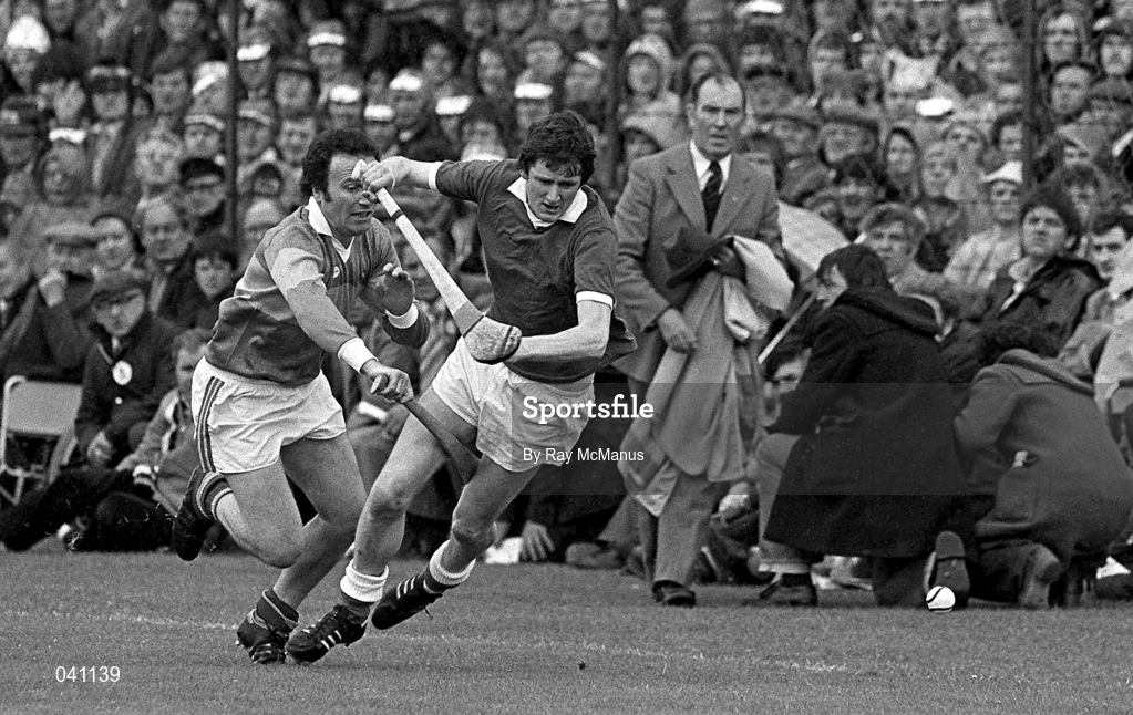 22 June 1980; Eamonn O'Donoghue of Cork in action against Paddy Williams of Tipperary during the Munster Senior Hurling Championship Semi-Final match between Tipperary and Cork at Semple Stadium in Thurles, Tipperary. Photo by Ray McManus/Sportsfile