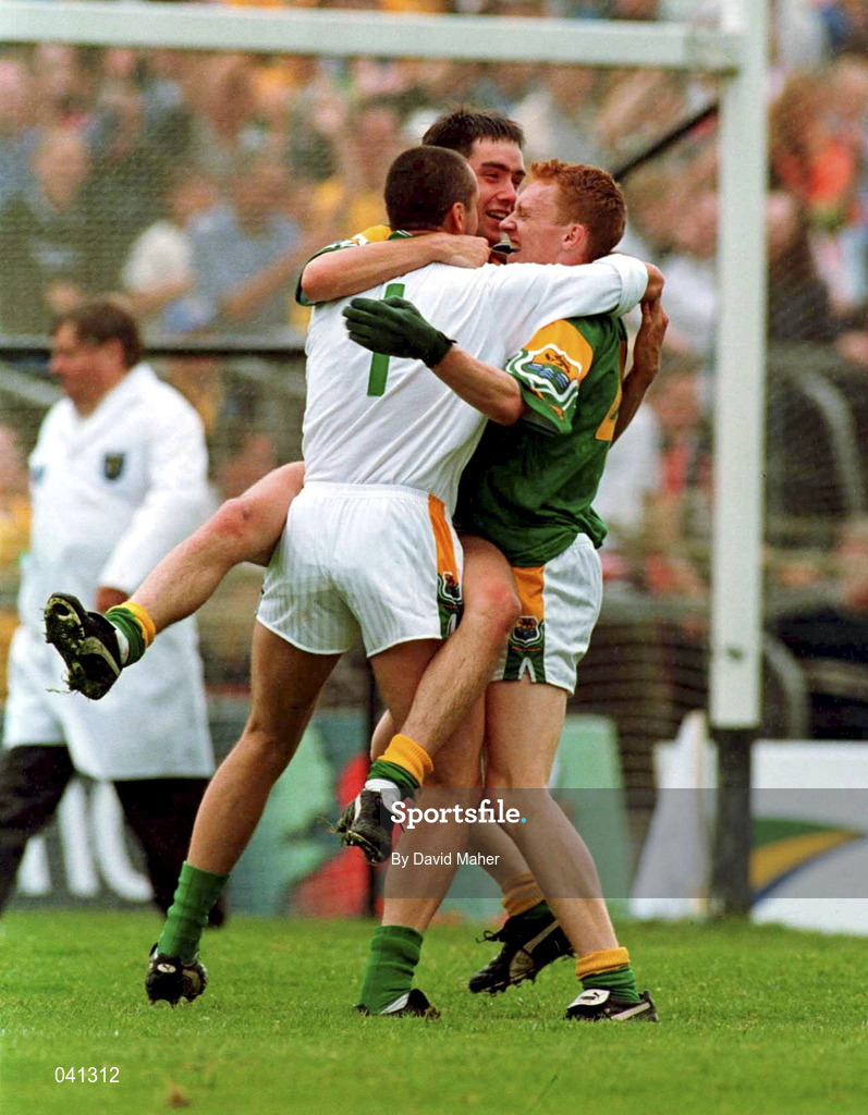 2 July 2000; Leitrim players, from left, Gareth Phelan, John McKeon and Michael McGuinness celebrate after victory in the Bank of Ireland Connacht Senior Football Championship Semi-Final match between Roscommon and Leitrim in Dr. Hyde Park in Roscommon. Photo by David Maher/Sportsfile