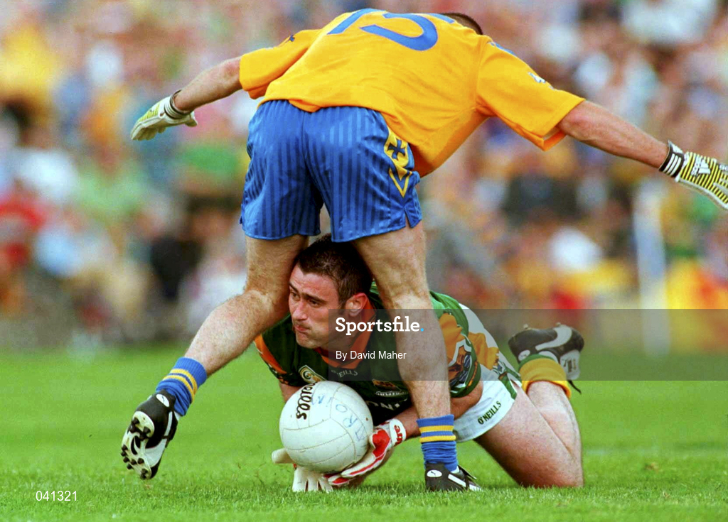 2 July 2000; Ciaran Murray of Leitrim is tackled by Frankie Dolan of Roscommon during the Bank of Ireland Connacht Senior Football Championship Semi-Final match between Roscommon and Leitrim in Dr. Hyde Park in Roscommon. Photo by David Maher/Sportsfile