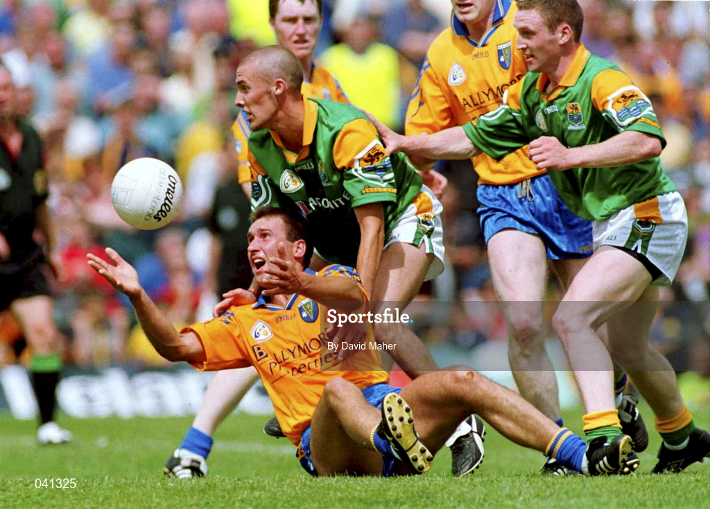 2 July 2000; John Gillooly of Roscommon in action against Derek Kelleher and Colin Regan of Leitrim during the Bank of Ireland Connacht Senior Football Championship Semi-Final match between Roscommon and Leitrim in Dr. Hyde Park in Roscommon. Photo by David Maher/Sportsfile