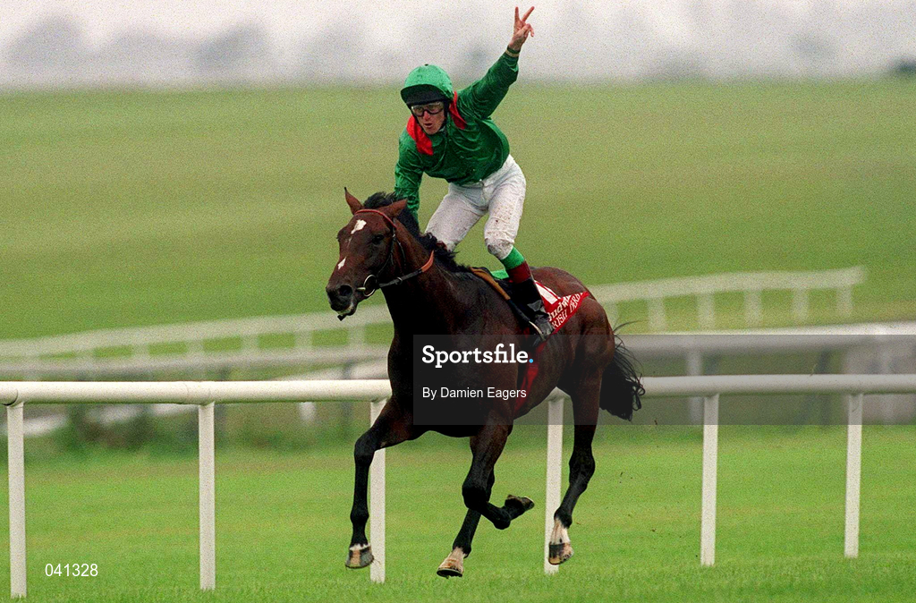 1 July 2000; Jockey Johnny Murtagh celebrates aboard Sinndar on their way to winning the Budweiser Irish Derby at The Curragh Racecourse in Kildare. Photo by Damien Eagers/Sportsfile