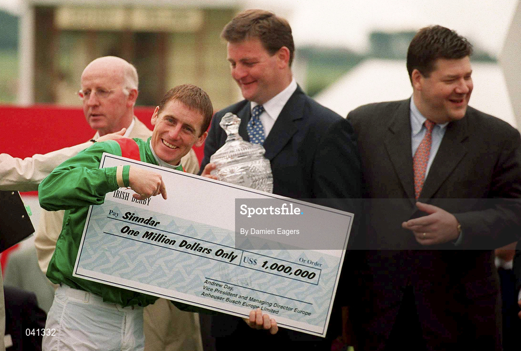 1 July 2000; Winning jockey Johnny Murtagh with a cheque for 1 million dollars after victory with Sinndar in the Budweiser Irish Derby at The Curragh Racecourse in Kildare. Photo by Damien Eagers/Sportsfile