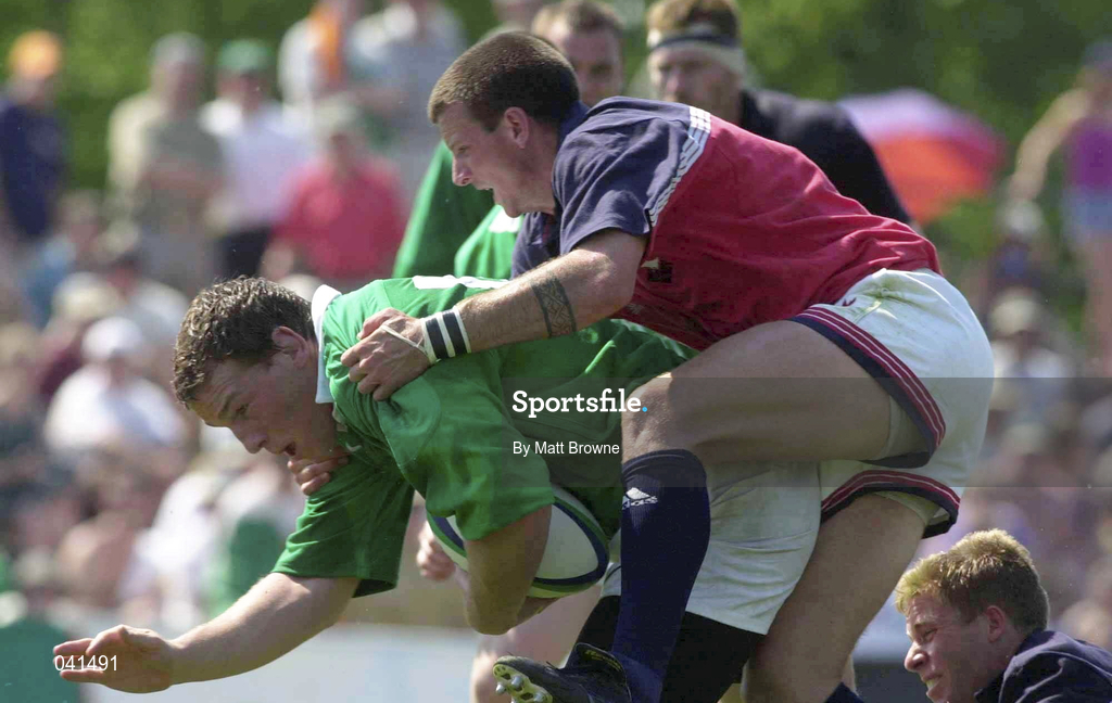 10 June 2000; Bob Casey of Ireland is tackled by Link Wilfley of USA during the Rugby International match between USA and Ireland at Singer Family Park in Manchester, New Hampshire, USA. Photo by Matt Browne/Sportsfile