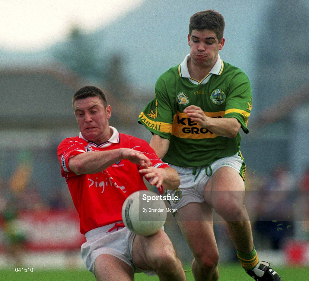 18 June 2000; Joe Kavanagh of Cork in action against Eamonn Fitzmaurice of Kerry during the Bank of Ireland Munster Senior Football Championship Semi-Final match between Kerry and Cork at Fitzgerald Stadium in Killarney, Kerry. Photo by Brendan Moran/Sportsfile