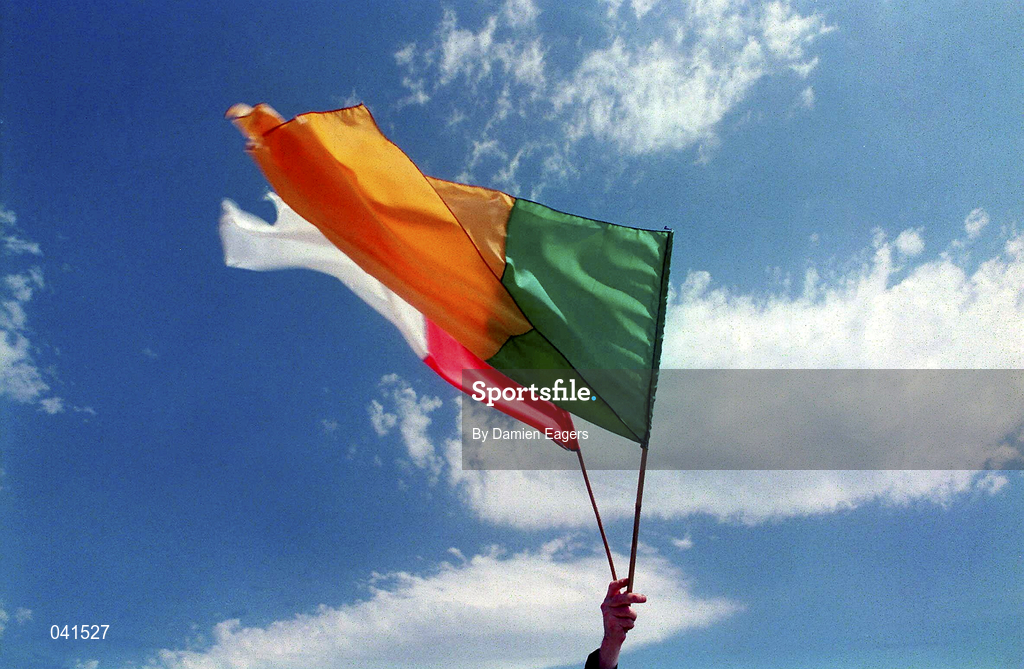 18 June 2000; A flag seller holds up Kerry and Cork flags prior to the Bank of Ireland Munster Senior Football Championship Semi-Final match between Kerry and Cork at Fitzgerald Stadium in Killarney, Kerry. Photo by Damien Eagers/Sportsfile