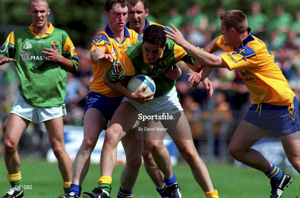 2 July 2000; Ronan Haslette of Leitrim in action against Alan Nolan and Michael Ryan, right, of Roscommon during the Bank of Ireland Connacht Senior Football Championship Semi-Final match between Roscommon and Leitrim in Dr. Hyde Park in Roscommon. Photo by David Maher/Sportsfile