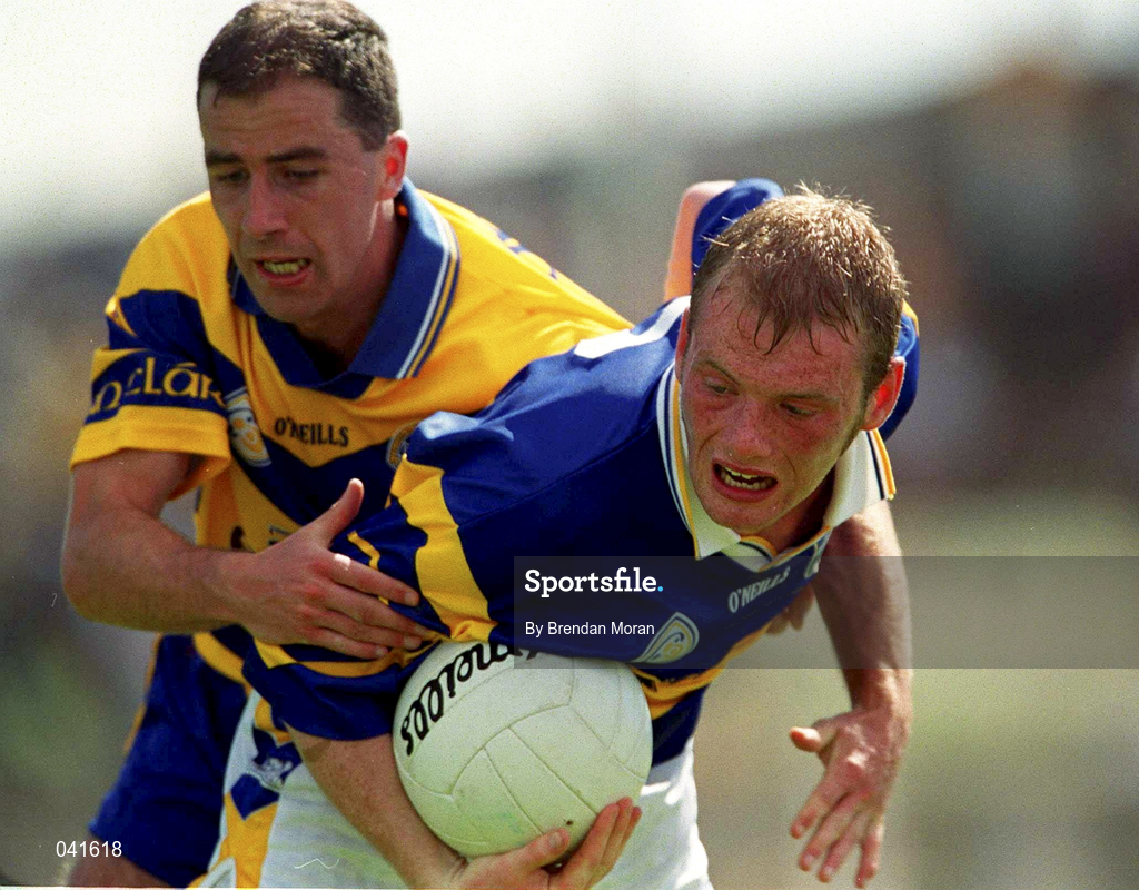 25 June 2000; Dan Hackett of Tipperary in action against Ger Keane of Clare during the Bank of Ireland Munster Senior Football Championship Semi-Final match between Clare and Tipperary at the Gaelic Grounds in Limerick. Photo by Brendan Moran/Sportsfile