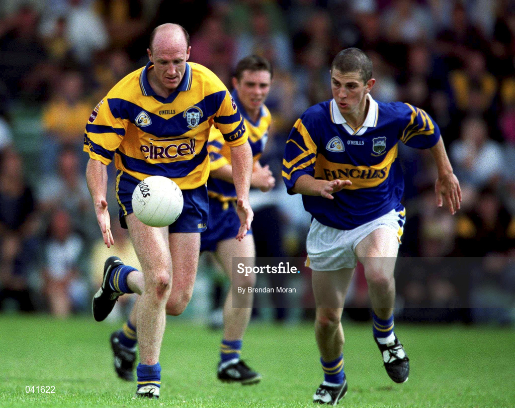 25 June 2000; Donal O'Sullivan of Clare in action against John Shanahan of Tipperary during the Bank of Ireland Munster Senior Football Championship Semi-Final match between Clare and Tipperary at the Gaelic Grounds in Limerick. Photo by Brendan Moran/Sportsfile
