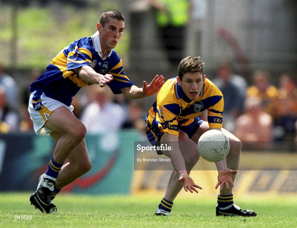 25 June 2000; Conor Whelan of Clare in action against John Shanahan of Tipperary during the Bank of Ireland Munster Senior Football Championship Semi-Final match between Clare and Tipperary at the Gaelic Grounds in Limerick. Photo by Brendan Moran/Sportsfile
