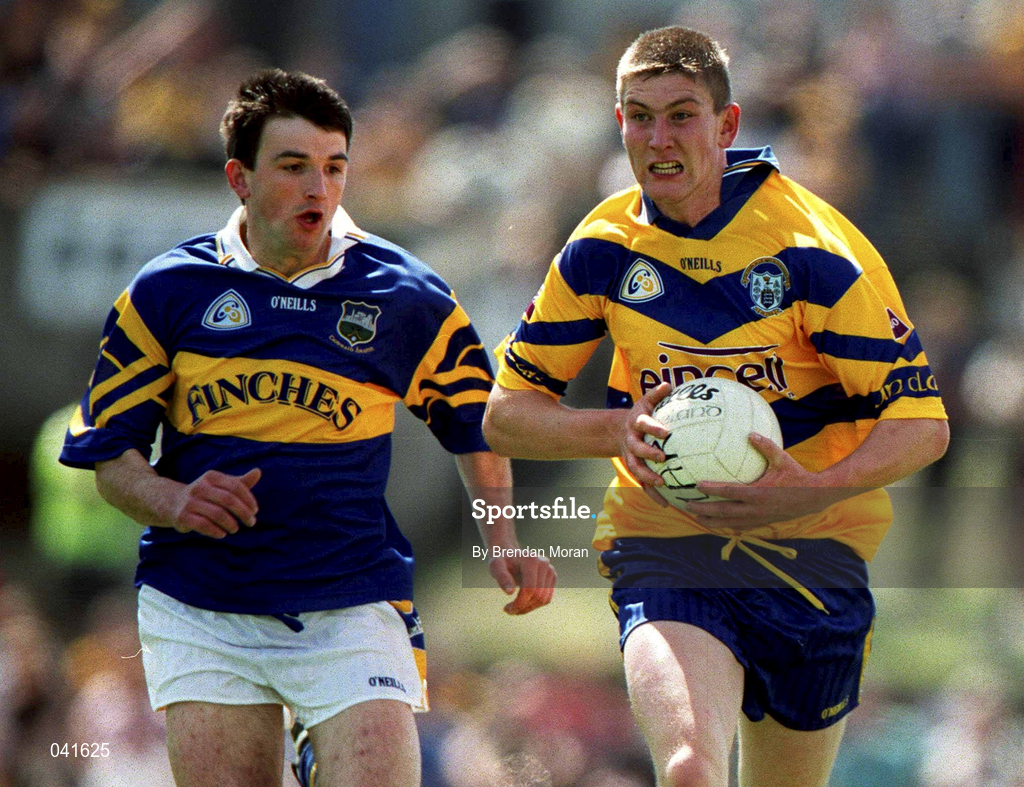 25 June 2000; David Russell of Clare in action against Dan Hackett of Tipperary during the Bank of Ireland Munster Senior Football Championship Semi-Final match between Clare and Tipperary at the Gaelic Grounds in Limerick. Photo by Brendan Moran/Sportsfile