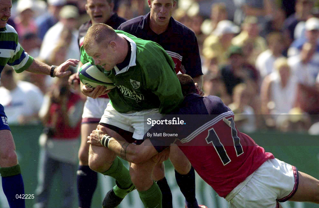 10 June 2000; Frank Sheahan of Ireland is tackled by Malakai Delai of USA during the Rugby International match between USA and Ireland at Singer Family Park in Manchester, New Hampshire, USA. Photo by Matt Browne/Sportsfile