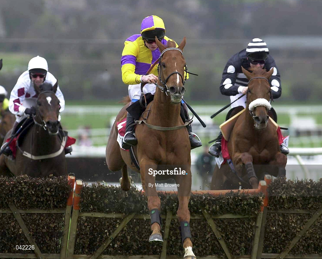 16 March 2000; General Cloney, with Ruby Walsh up, centre, lead the field first time round, during the Elite Racing Club Triumph Hurdle on Day Three of the Cheltenham Racing Festival at Prestbury Park in Cheltenham, England. Photo by Matt Browne/Sportsfile