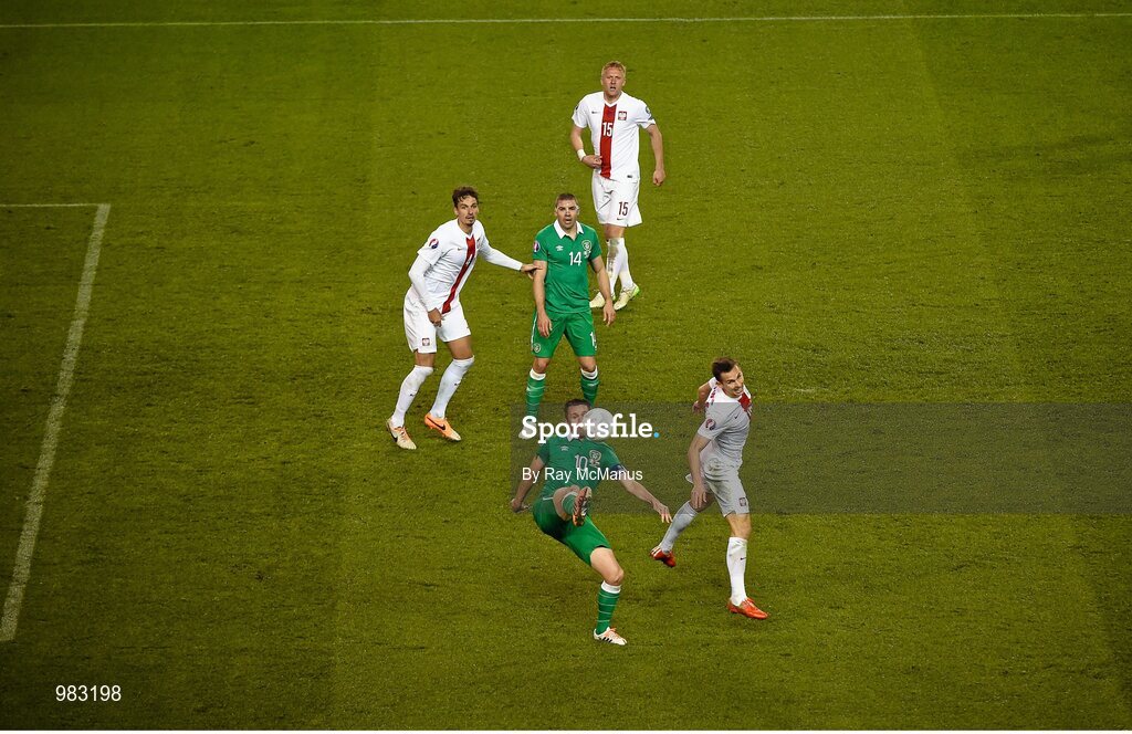 29 March 2015; Republic of Ireland's Robbie Keane and Jon Walters, top, in action against Poland's Lukasz Szukata, left, Kamil Glik, top, and Pawel Olkowski. UEFA EURO 2016 Championship Qualifier, Group D, Republic of Ireland v Poland. Aviva Stadium, Lansdowne Road, Dublin. Picture credit: Ray McManus / SPORTSFILE