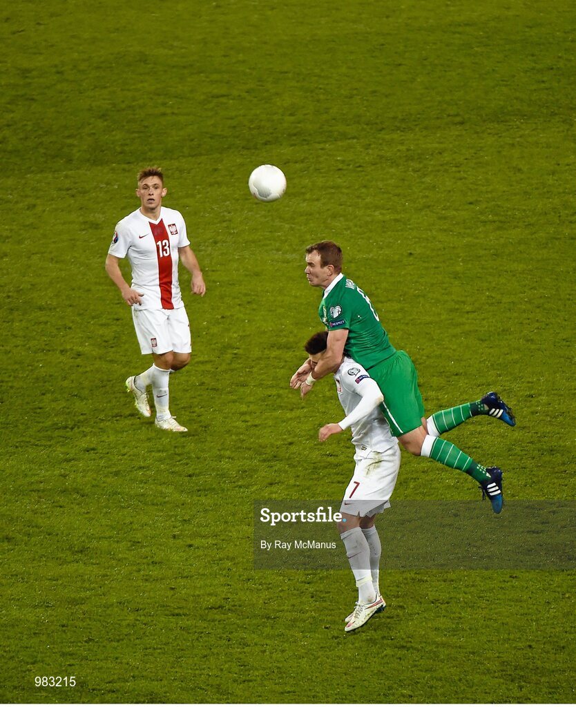 29 March 2015; Glen Whelan, Republic of Ireland, in action against Maciej Rybus, left, and Arkadiusz Milik, Poland. UEFA EURO 2016 Championship Qualifier, Group D, Republic of Ireland v Poland. Aviva Stadium, Lansdowne Road, Dublin. Picture credit: Ray McManus / SPORTSFILE