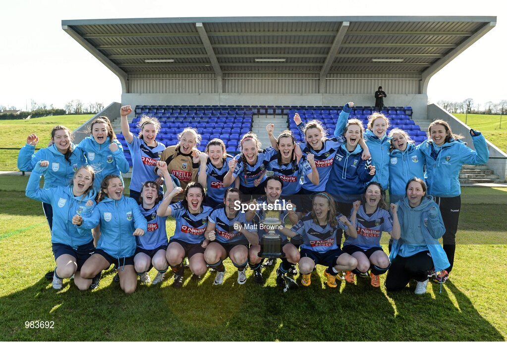 11 April 2015; UCD captain Ciara Grant lifts the cup as her team-mates celebrate. WSCAI Intervarsities Cup Final, UCD v UCC, Waterford IT, Waterford. Picture credit: Matt Browne / SPORTSFILE