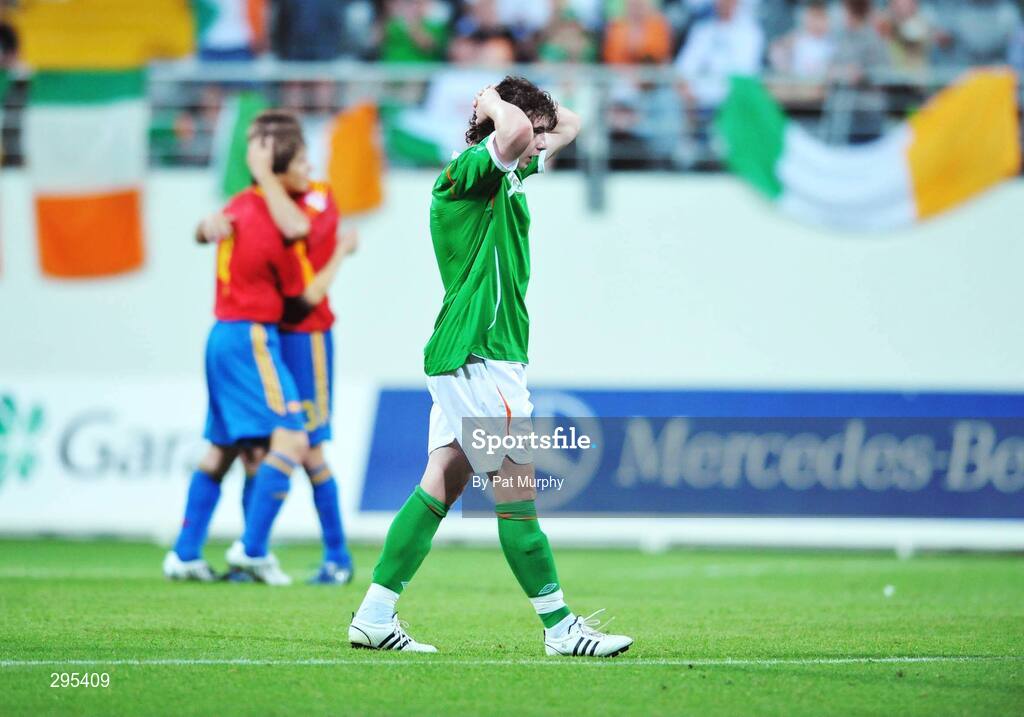 10 May 2008; Republic of Ireland's Aaron Doran shows his disapointment at the final whistle while the Spanish team celebrate. UEFA European Under-17 Championship Group B, Republic of Ireland v Spain, Mardan Sport Complex, Antalya, Turkey. Picture credit: Pat Murphy / SPORTSFILE