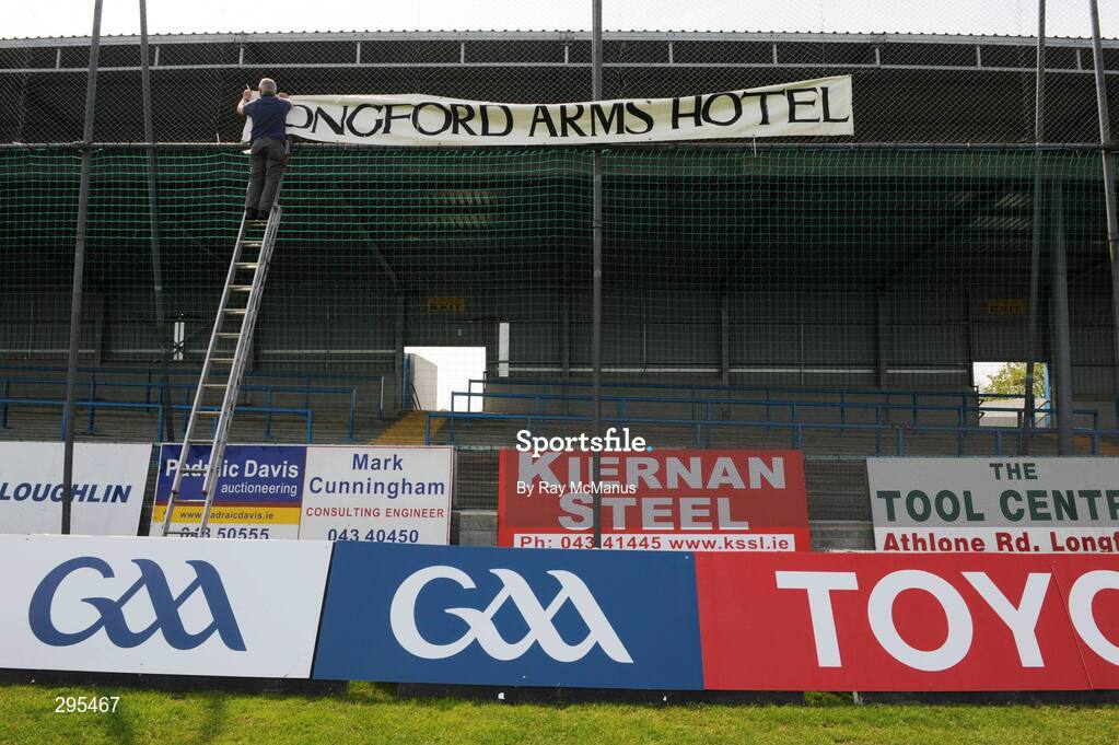 11 May 2008; Paddy Madden erects a sign in favour of the Longford Arms Hotel before the game. GAA Football Leinster Senior Championship, Longford v Westmeath, Pearse Park, Longford. Picture credit: Ray McManus / SPORTSFILE