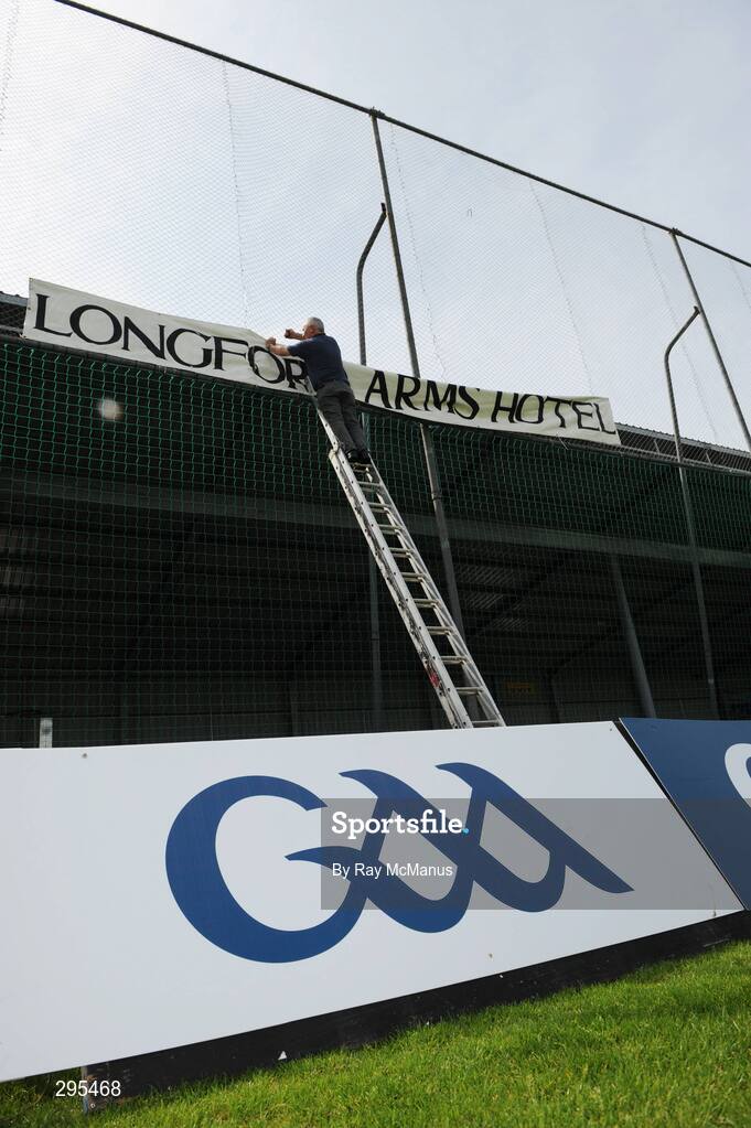 11 May 2008; Paddy Madden erects a sign in favour of the Longford Arms Hotel before the game. GAA Football Leinster Senior Championship, Longford v Westmeath, Pearse Park, Longford. Picture credit: Ray McManus / SPORTSFILE