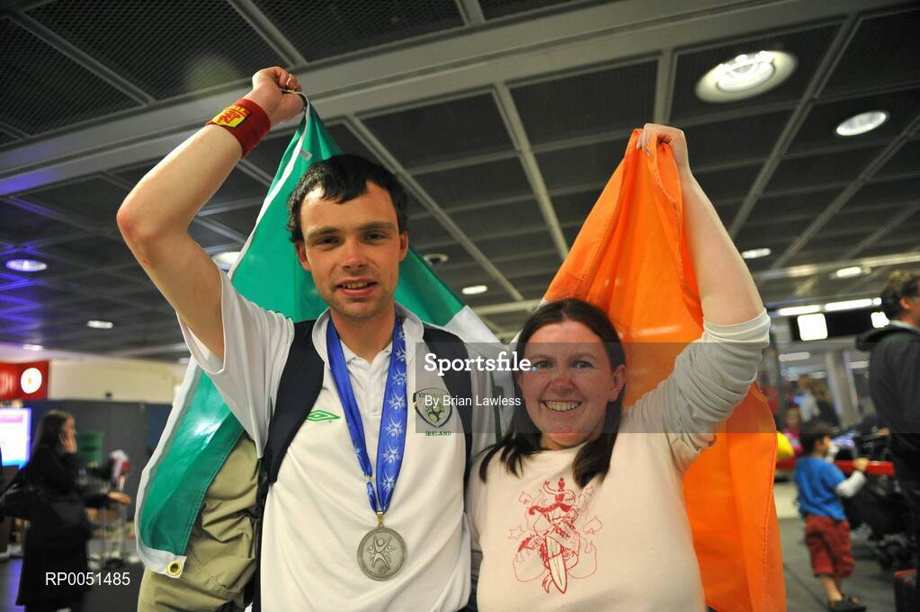 8 May 2008; Joseph Kearney, Team Ireland, with his friend Marion O'Rourke on arrival in Dublin Airport. TEAM Ireland returned from the Special Olympics European Football Tournament which took place in Switzerland as competition runners up having lost out to Latvia in the finals by one goal.  24 countries in total took part in the tournament to celebrate European Football Week, supported by UEFA. Dublin Airport. Picture credit: Brian Lawless / SPORTSFILE