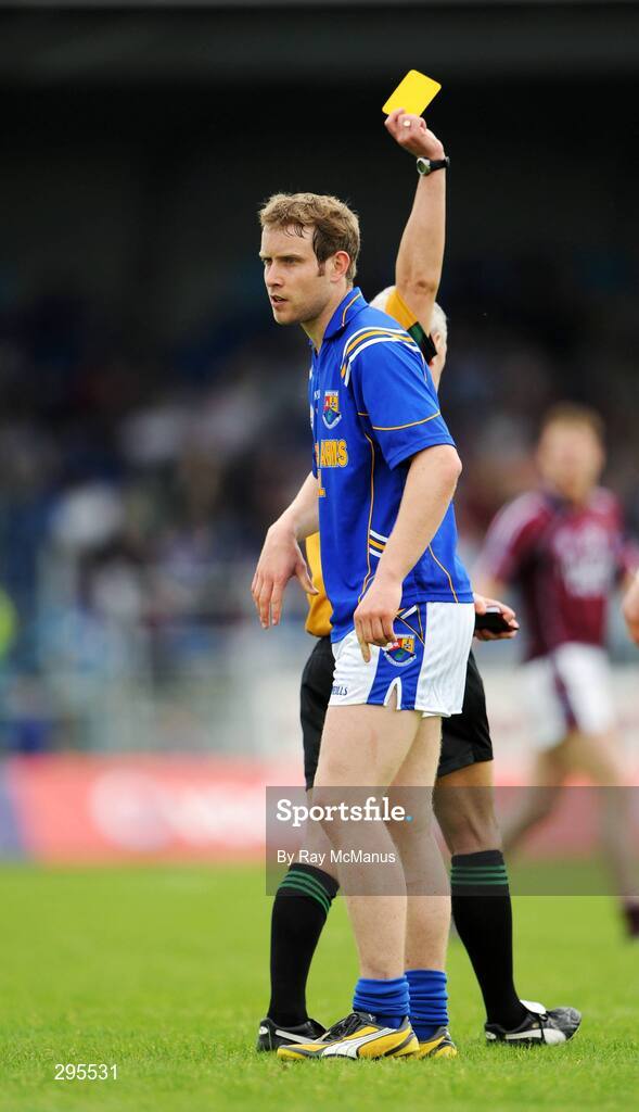 11 May 2008; Brian Kavanagh, Longford, is shown a yellow card by referee Michael Hughes. GAA Football Leinster Senior Championship, Longford v Westmeath, Pearse Park, Longford. Picture credit: Ray McManus / SPORTSFILE